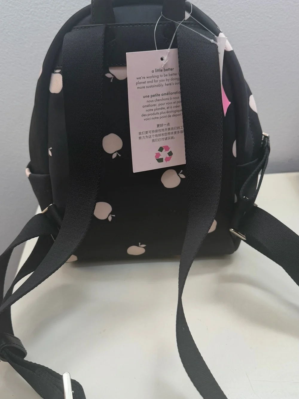 kate spade Black Mini Backpack with Pale Pink Apple Motif